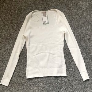 H&M white long sleeved sweater; new with tags never worn. Runs large